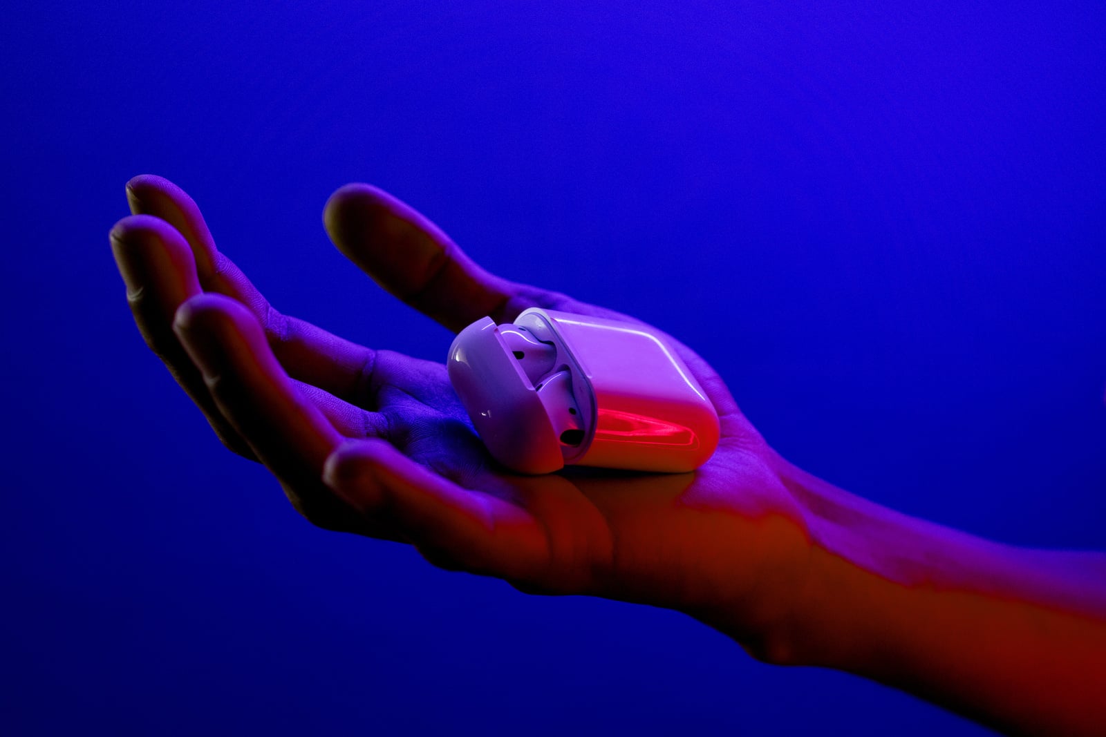 Tech Glow Hand Holding Wireless Earbuds 